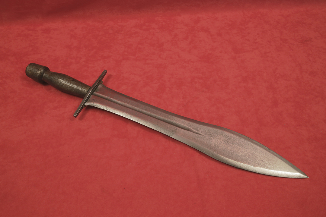 Espada de Alfonso X con guarda de latón maciza y acabado rústico
